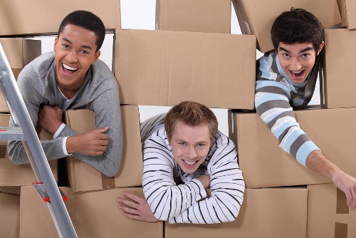 Residential removals team handling furniture in Riddlesdown