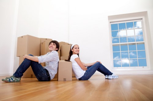 Packed boxes and labelled belongings inside a self storage unit