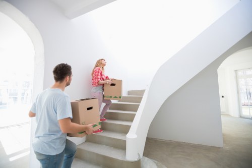 Removal van loading household items for a flat move in Riddlesdown